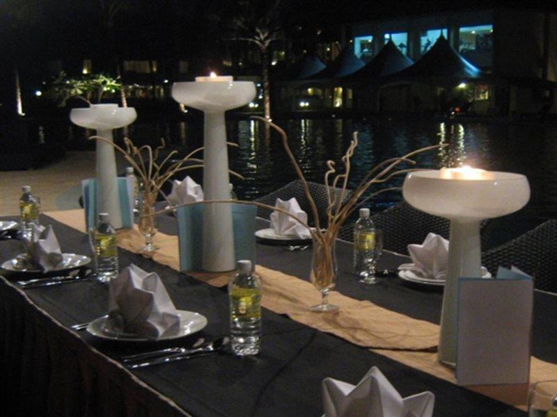 Damai Puri Resort & Spa Kuching Exteriör bild A table set for a formal dinner